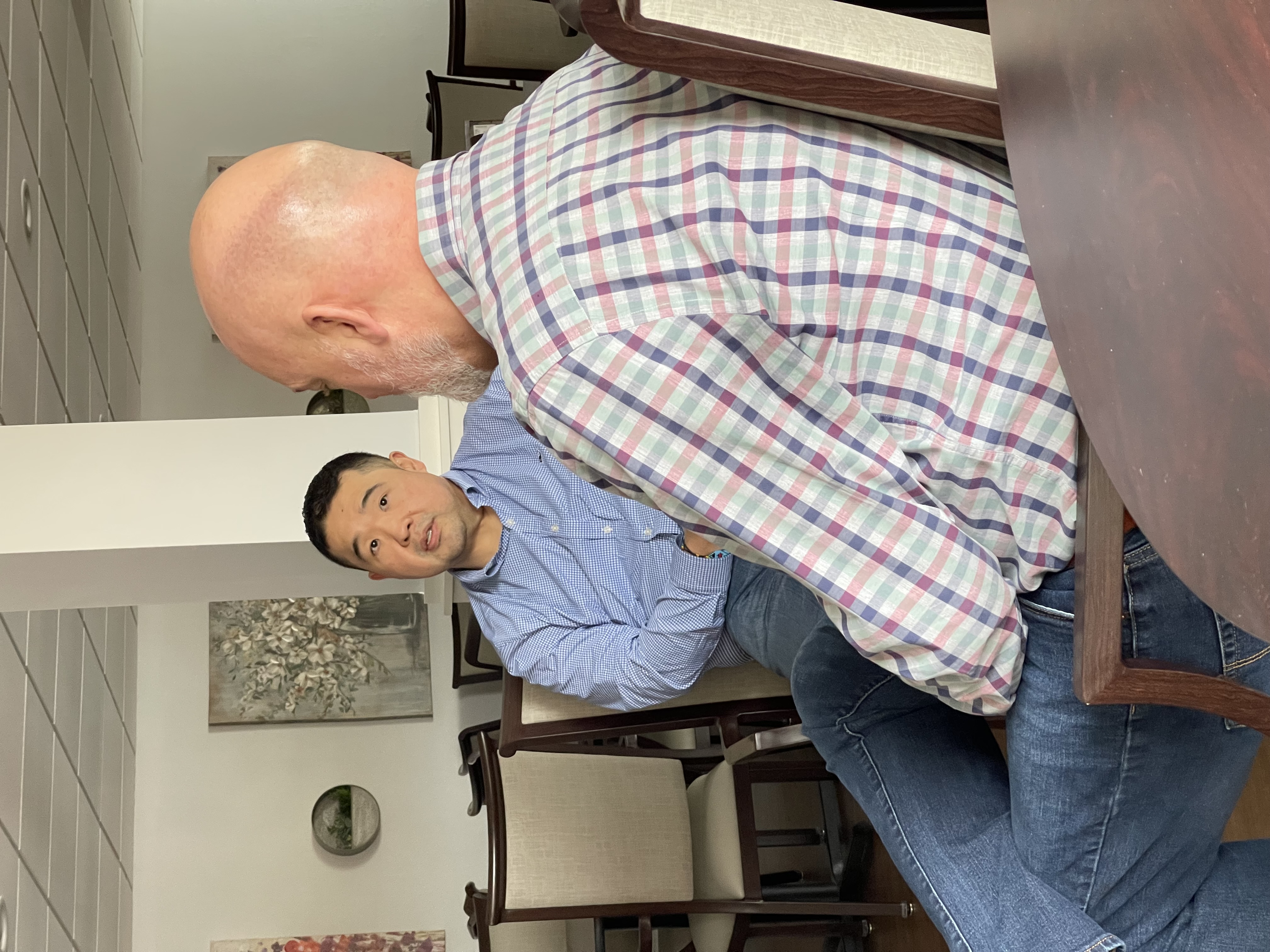 Lou in conversation, present-day work with a family business owner